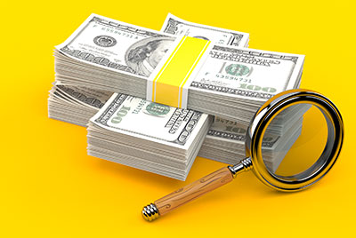 money magnifying glass audit